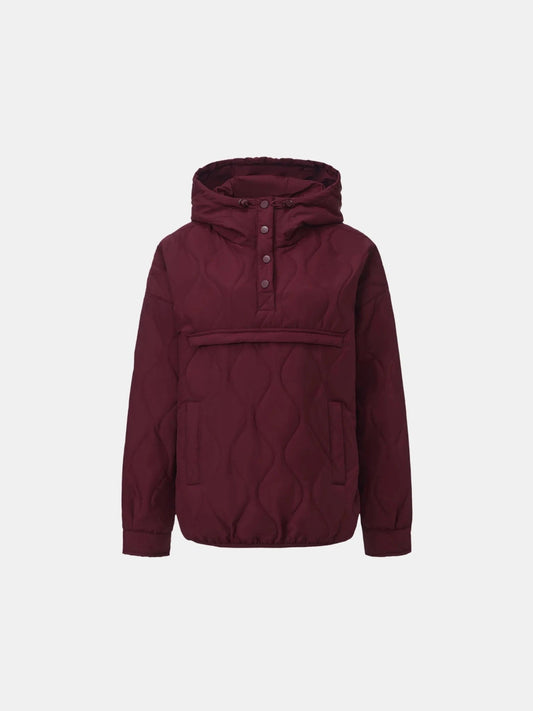 Women's Packable Quilted Puffer Hoodie in black – front view