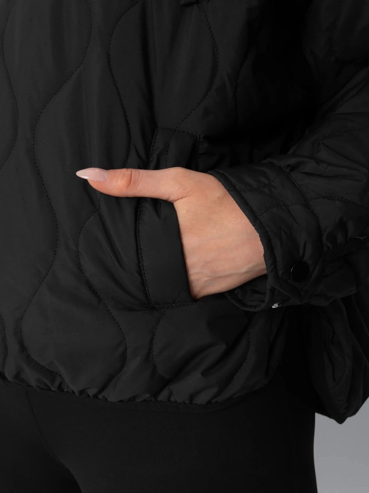 Women's Packable Quilted Puffer Hoodie in black – view 6