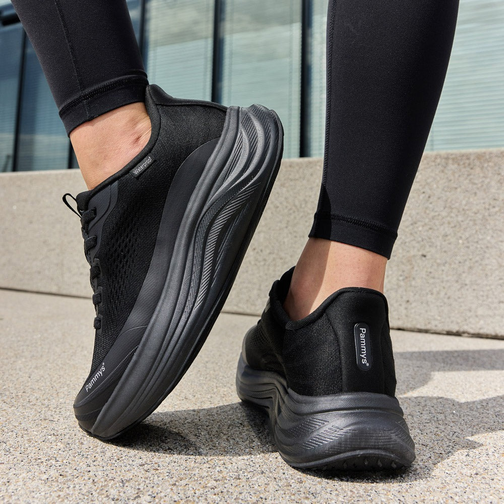 Women's Waterproof Hands-Free Trainers in black – on foot outdoors