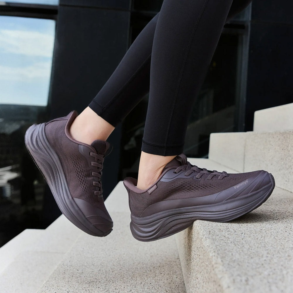 Women's Waterproof Hands-Free Trainers in chocolate brown – on foot outdoors