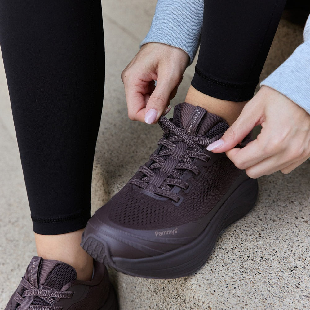 Women's Waterproof Hands-Free Trainers in chocolate brown – on foot, close-up
