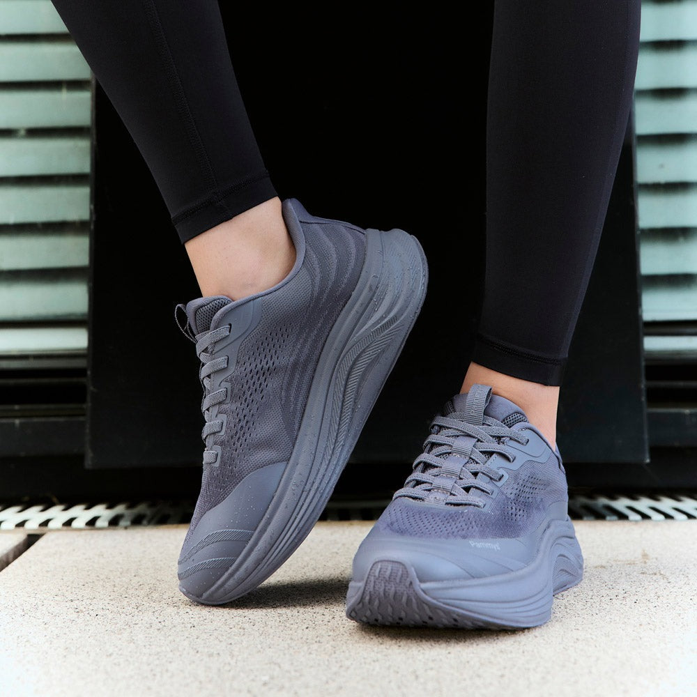 Women's Waterproof Hands-Free Trainers in dark grey – on foot, close-up