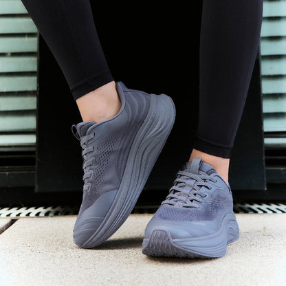Women's Waterproof Hands-Free Trainers in dark grey – on foot, close-up