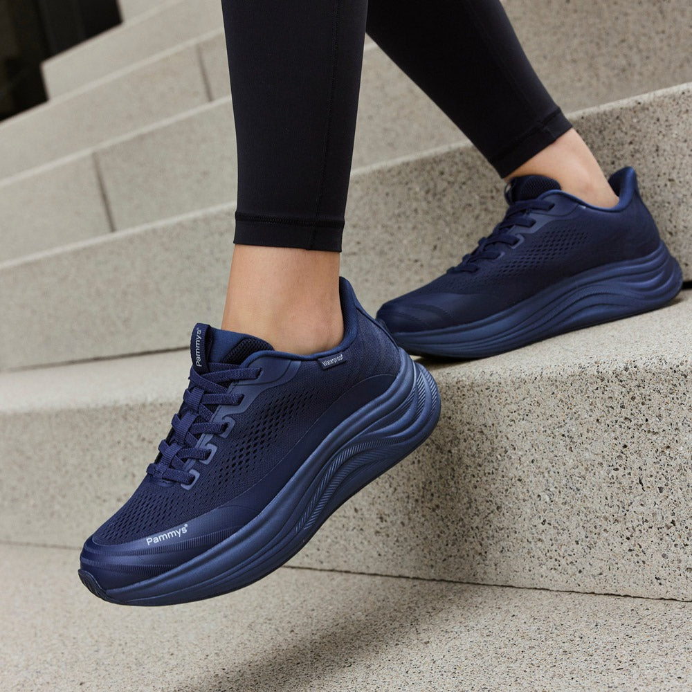 Women's Waterproof Hands-Free Trainers in navy – on foot, close-up
